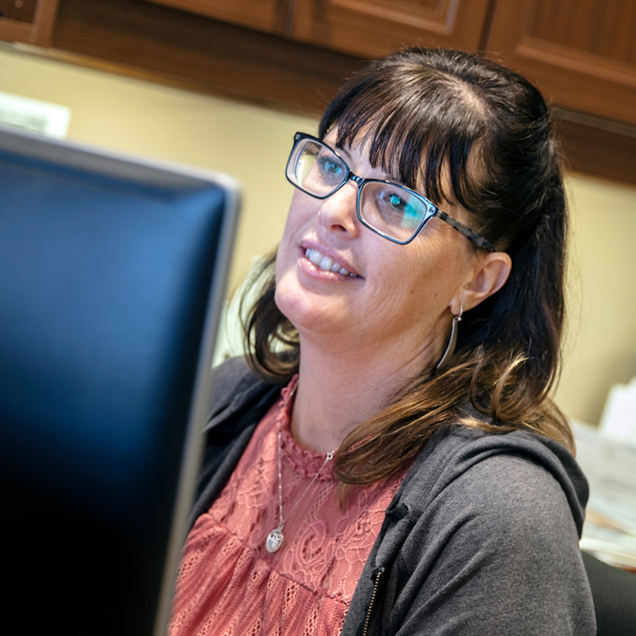 Team member supporting small businesses with administrative services at Padgett Tucson.